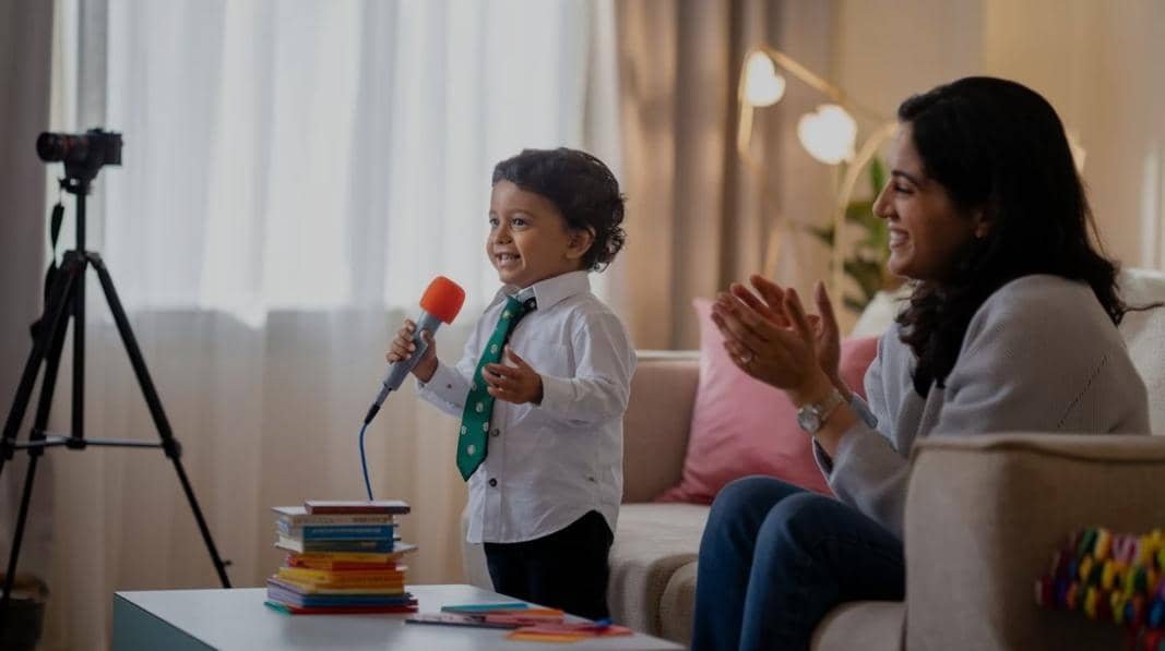 A child confidently speaking